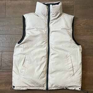 Black and cream reservable zip up puffer vest
